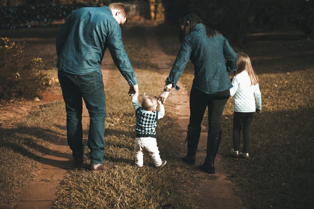 Parents walking with small children